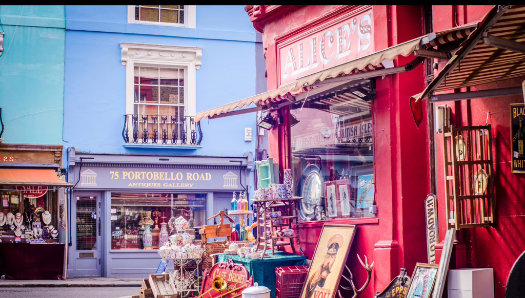 Colourful buildings and antique shops on London's Portobello Road, a famous shopping street and popular tourist attraction