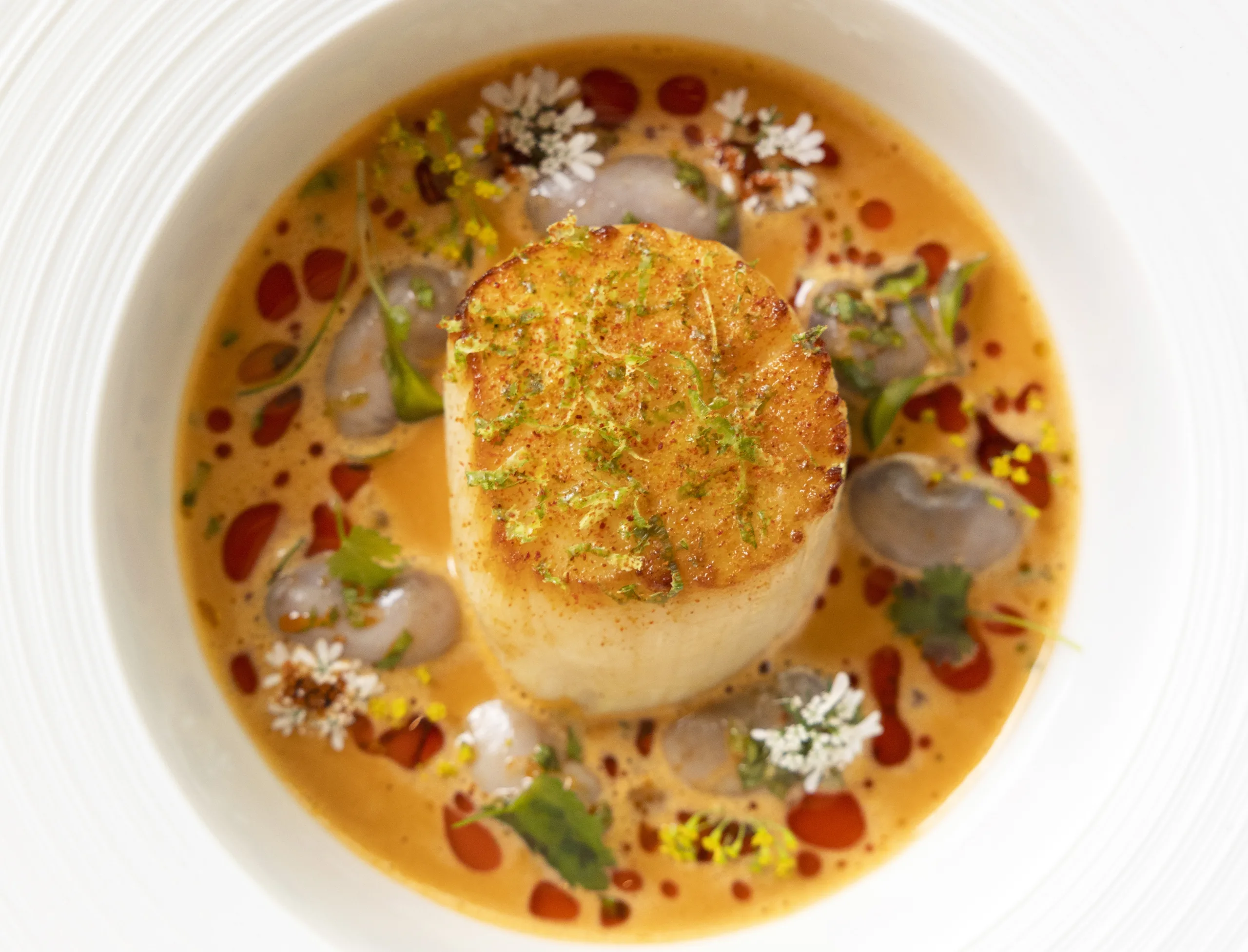 Orkney Scallop Datterini Tomato and Basil dish in The Ritz Restaurant