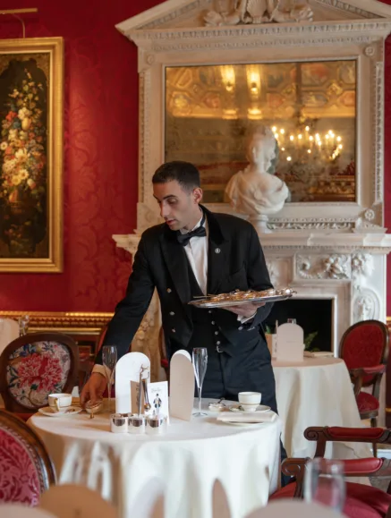 Waiter in William Kent Room serving Afternoon Tea at The Ritz