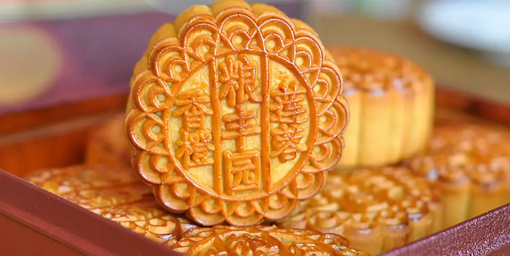 Mooncake with good luck symbol printed on pastry